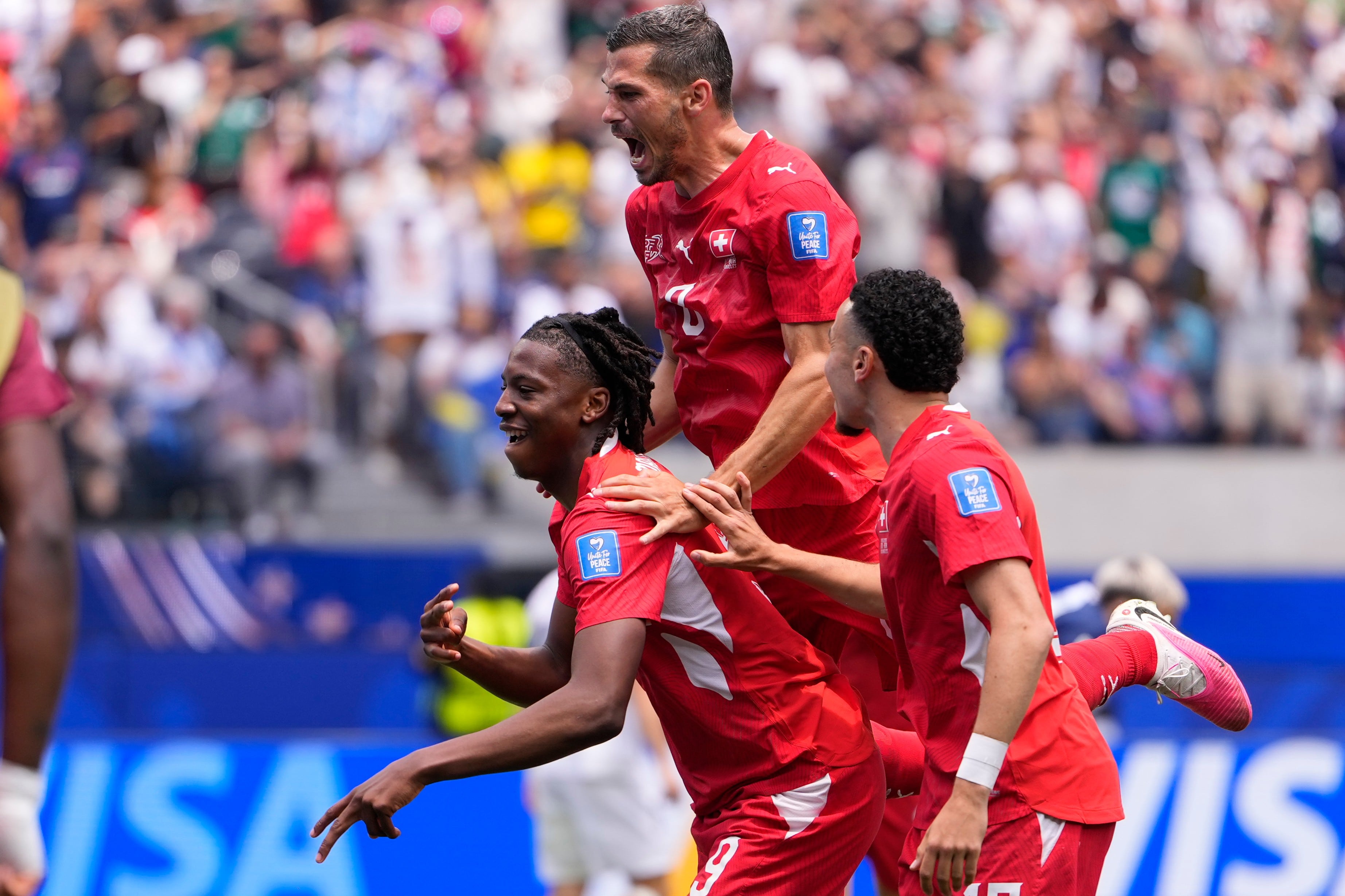 Johan Manzambi scores two as Switzerland beats Bosnia-Herzegovina 4-1 at the World Cup