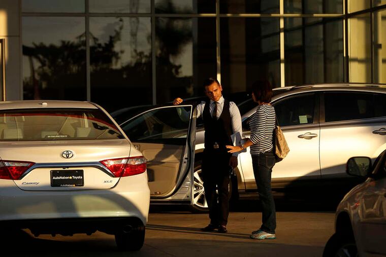 Old-school shopping at an AutoNation lot in California. AutoNation has spent millions on its digital- sales rollout.