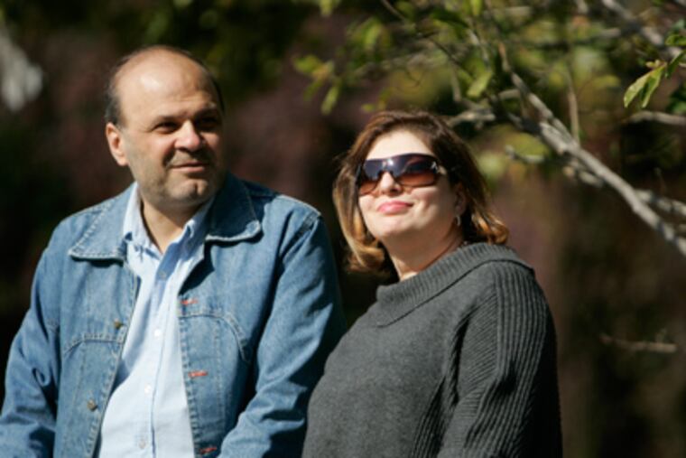Hazim Ibrahem and his wife, Shatha Ali. He encouraged her to seek help for depression, and "now I feel better." (David Swanson / Staff Photographer)