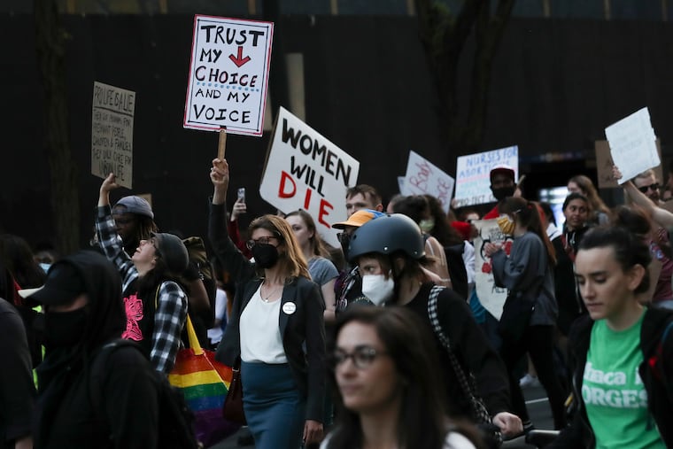 Protesters in support of abortion rights march down Market Street in 2022 after a leak revealed that the U.S. Supreme Court was poised to overturn Roe v. Wade.