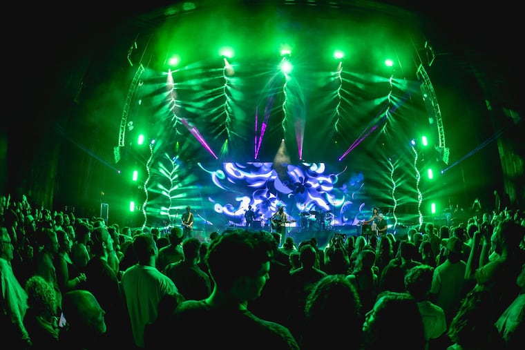 Sixers coach Nick Nurse (on far right) playing keyboards with Philly band Mt. Joy at the Mann Center on Friday.