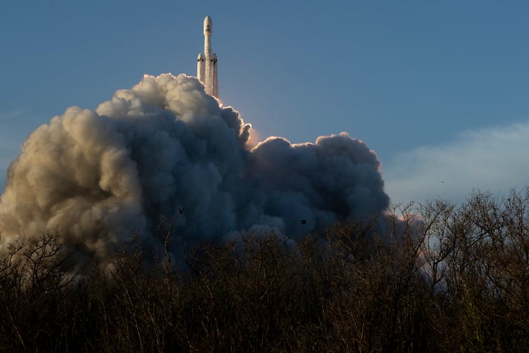 This image provided by NASA shows a SpaceX Falcon Heavy rocket with the space observatory Roman Telescope launching at the Kennedy Space Center in Cape Canaveral, Fla., Sunday, Aug. 30, 2026.