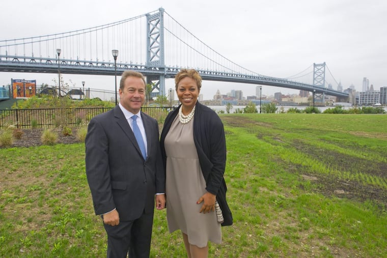 Camden County Freeholder Director Louis Cappelli Jr. and Camden Mayor Dana L. Redd stand on the site of the former Riverfront Prison, just north of the Ben Franklin Bridge in North Camden. This is one of the sites being promoted to attract Amazon’s second headquarters project.
