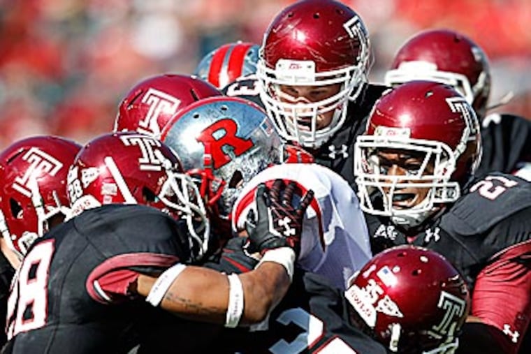 Miami defensive coordinator Mark D'Onofrio and New York Giants assistant Matt Rhule are the finalists for Temple's head coaching job, several sources have confirmed. (Mel Evans/AP file photo)