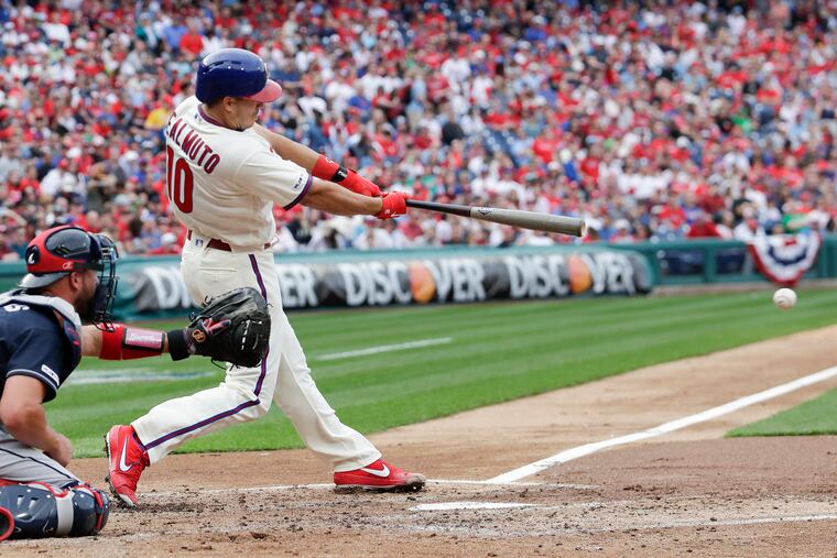 Phillies J.T. Realmuto hits a second-inning RBI single against the Atlanta Braves on Saturday, March 30, 2019 in Philadelphia.