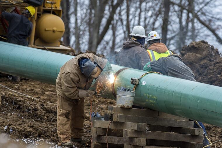 Welders join segments of the Mariner East pipeline in Western Pennsylvania earlier this year.