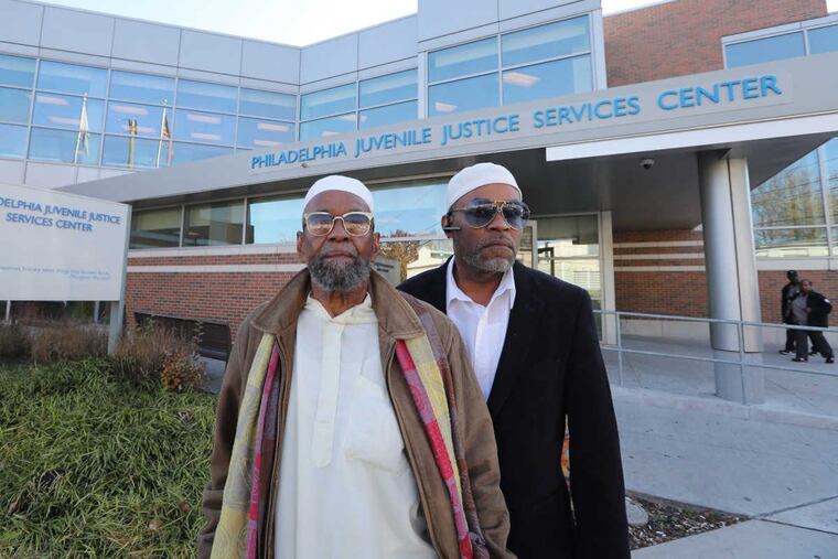 Darryl Goodman with his father Bruce Goodman outside the JJSC, the city’s youth detention center, where they have both been volunteers Tuesday November 28, 2017 DAVID SWANSON / Staff Photographer