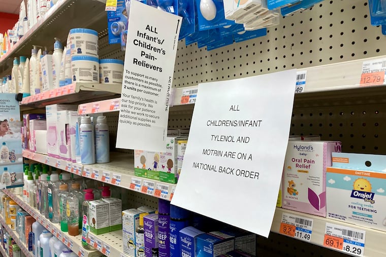 A sign is placed near the section for children's medicine, Sunday, Dec. 18, 2022 at a CVS in Greenlawn, N.Y. Caring for a sick child has become even more stressful than usual for many U.S. parents in recent weeks due to shortages of Children’s Tylenol and other medicines.