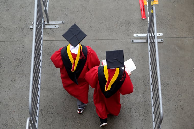 New graduates walk into the High Point Solutions Stadium before the start of the Rutgers University graduation ceremony in Piscataway Township, N.J., in 2018. The Supreme Court is about to hear arguments over President Joe Biden’s student debt relief plan. It's a plan that impacts millions of borrowers who could see their loans wiped away or reduced.