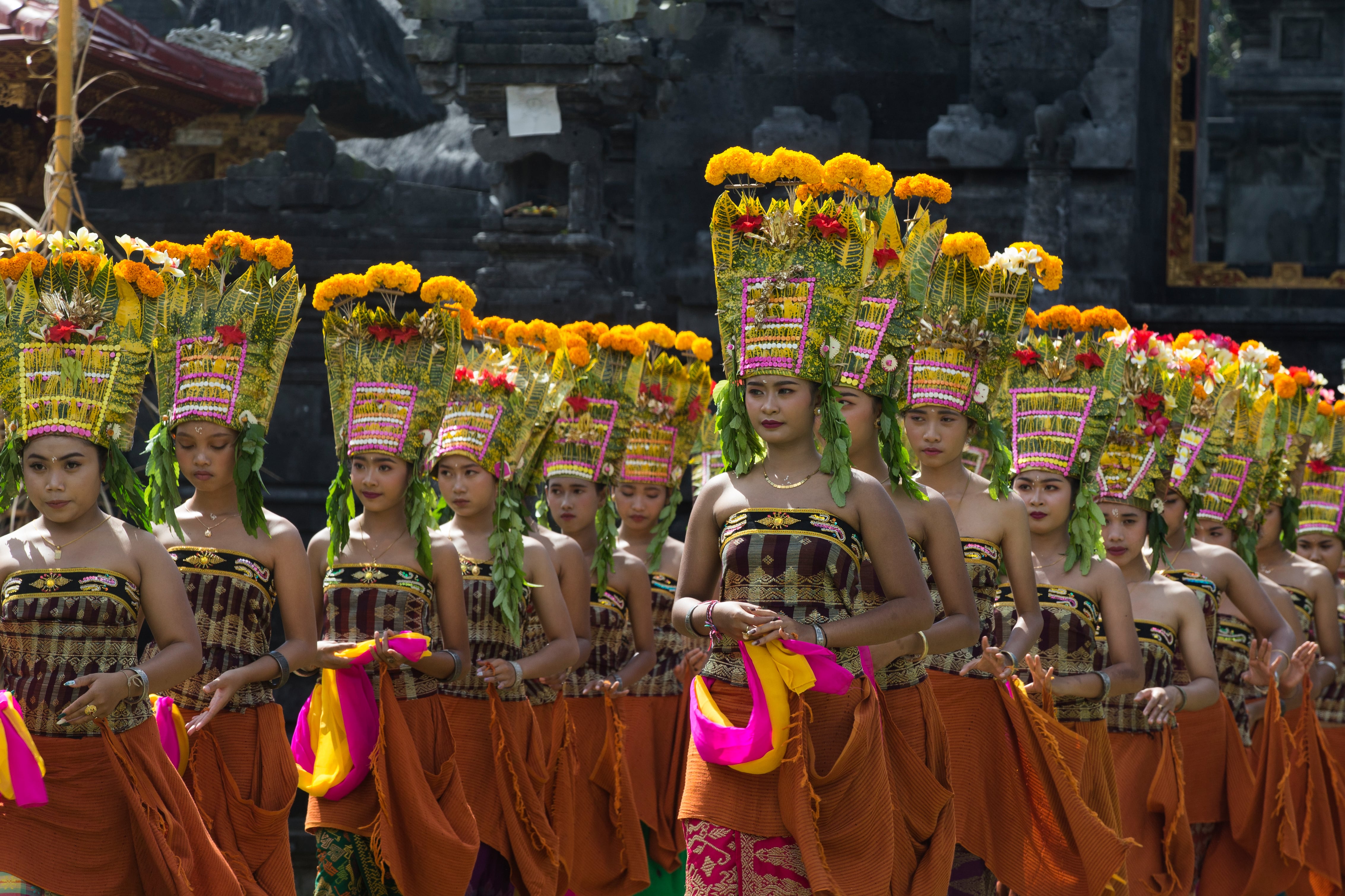 Photos show teen girls in Bali performing a sacred dance during a traditional Hindu ceremony