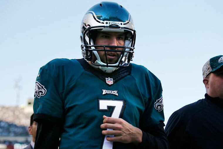 Sam Bradford walks off of the field after being hurt.