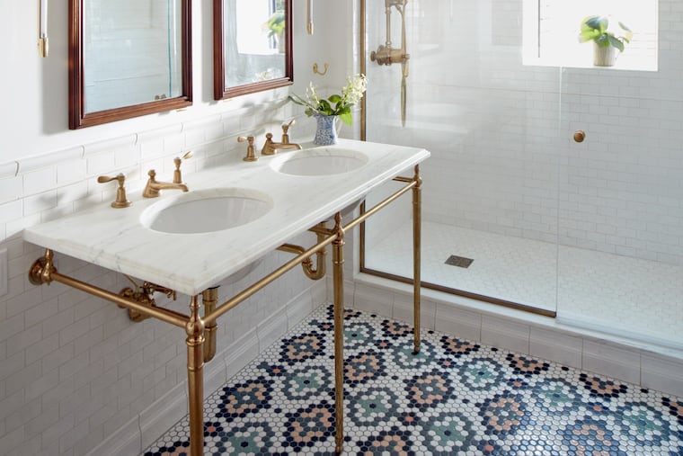 The intricate tile pattern for this master bath was created by senior designer Chelsie Lee of Jessica Helgerson Interior Design.