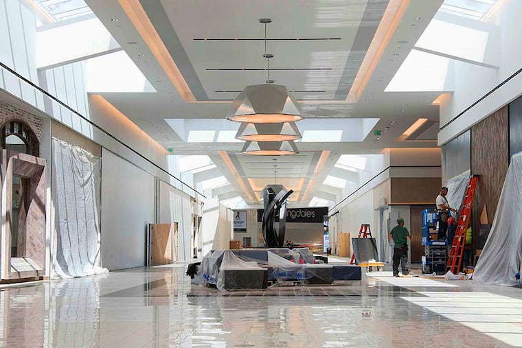 In the luxury wing of King of Prussia, construction workers were still busy in early August. Retailers including designer shoe retailer Jimmy Choo are among the tenants there.