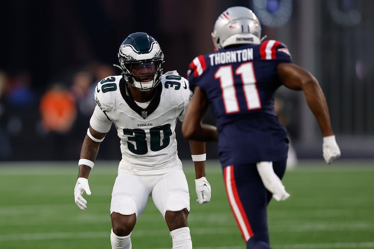 Cornerback Quinyon Mitchell, the Eagles' first-round pick, watches New England Patriots wide receiver Tyquan Thornton during their preseason game on Aug. 15.