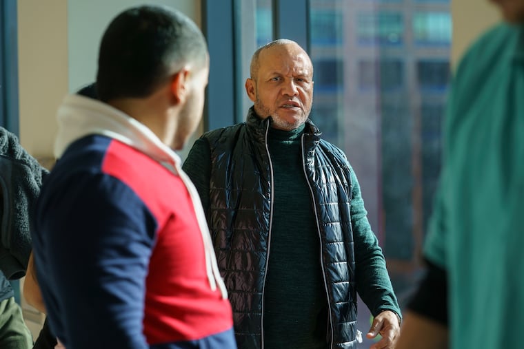 Moises Rodriguez, center, pleaded guilty Monday for his role in operating a heroin ring hidden in the basement of a home on a suburban street in Warminster.