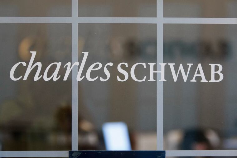 This July 14, 2010, file photo, shows a Charles Schwab office in Oakland, Calif. Schwab plans to buy rival TD Ameritrade Holding Corp. (AP Photo/Paul Sakuma, File)