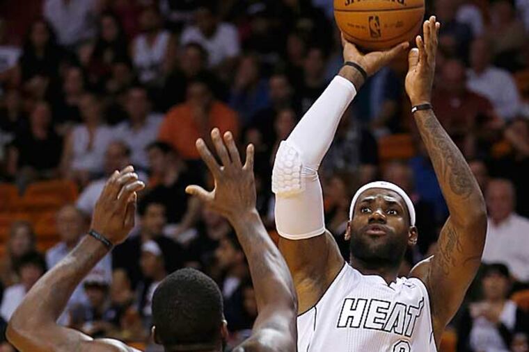 Miami Heat's LeBron James (6) prepares to shoot over Washington Wizards' Martell Webster (9) during the first half of an NBA basketball game in Miami, Saturday, Dec 15, 2012. (Alan Diaz/AP)