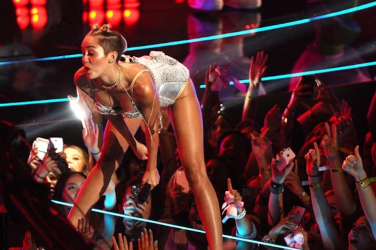Miley Cyrus performs at the MTV Video Music Awards on Sunday, Aug. 25, 2013, at the Barclays Center in the Brooklyn borough of New York. (Photo by Charles Sykes/Invision/AP)