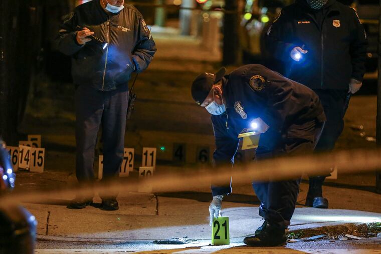 A 54 year-old man was fatally shot and his 22 year-old son was shot multiple times and is in critical condition in a shooting that happened just steps from the house at 30th and York streets in the 22nd police district. Detectives and crime scene officers work the scene.