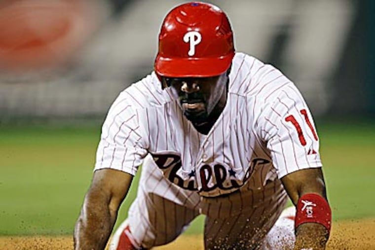 Phillies manager Charlie Manuel benched shortstop Jimmy Rollins for failing to run out a popout on Thursday. (Matt Slocum/AP)