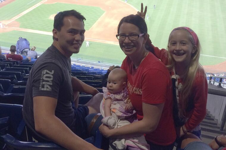 From left: Steve Price, Jennifer Blatman (holding baby Emily) and Sophia.