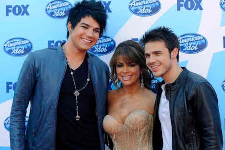 "American Idol" finalists Adam Lambert (left) and Kris Allen flank show judge Paula Abdul before the finale last night.