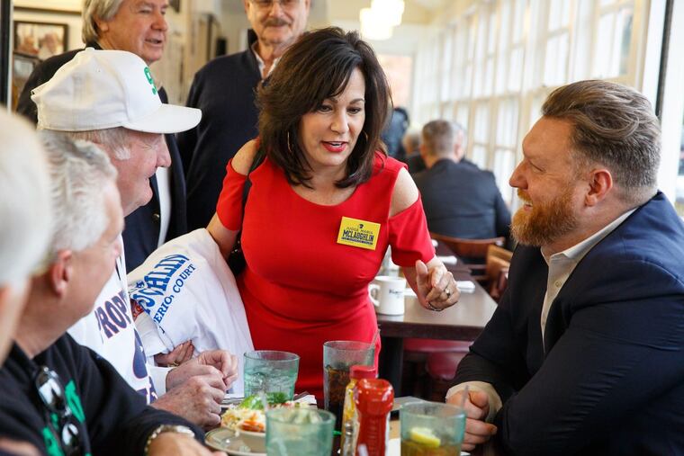 Judge Maria McLaughlin, center, on election day. She won a seat on the Pa. Superior Court. JESSICA GRIFFIN / Staff Photographer