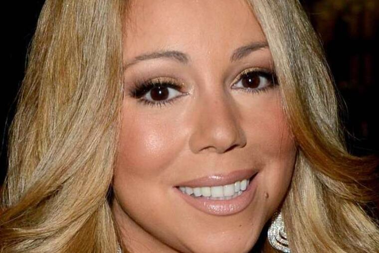 Mariah Carey's free to dish, but her soon-to-be ex is not.