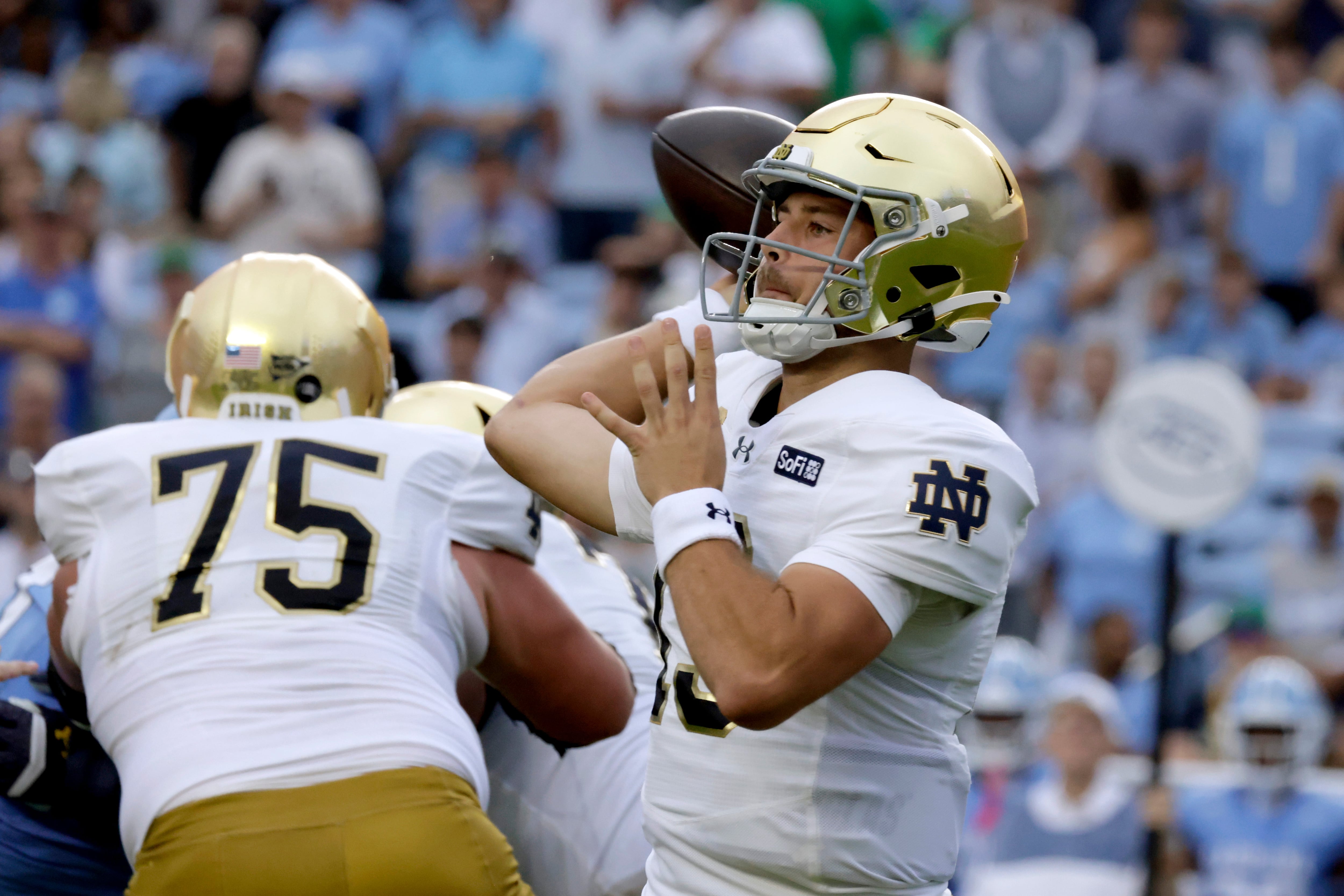 Carr, ground game help No. 3 Notre Dame push past North Carolina 37-26 for 15th straight win