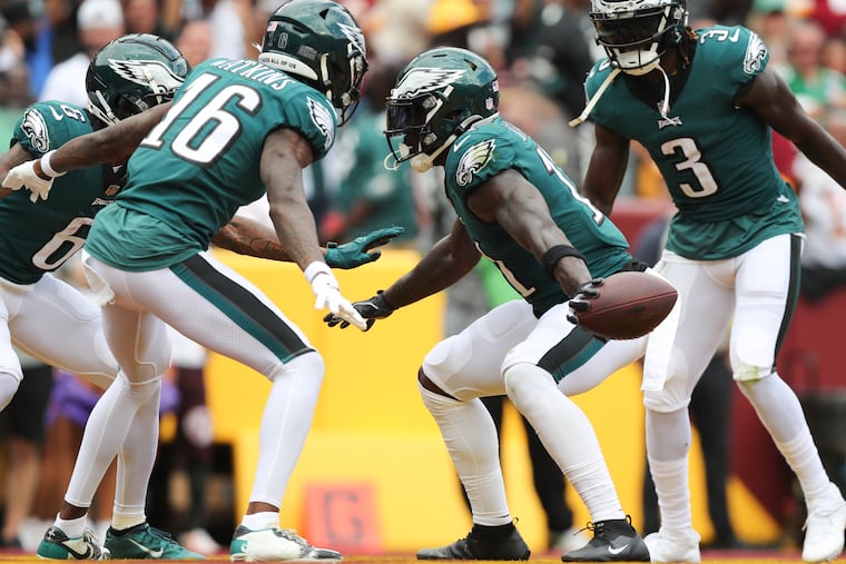 Eagles wide receiver A.J. Brown celebrates his second-quarter touchdown catch with his teammates against the Washington Commanders at FedExField in Landover, MD on Sunday, September 25, 2022.
