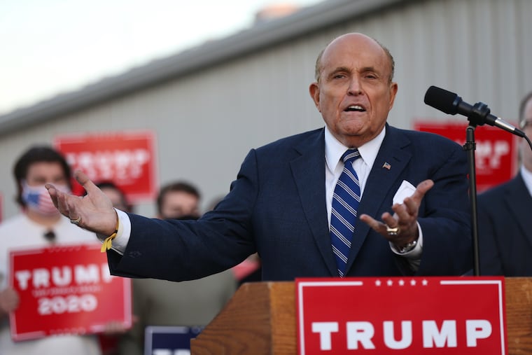 Rudy Giuliani speaks at a news conference about President Donald Trump’s legal challenges to the election in Pennsylvania at Atlantic Aviation in Philadelphia on Wednesday, Nov. 4, 2020.