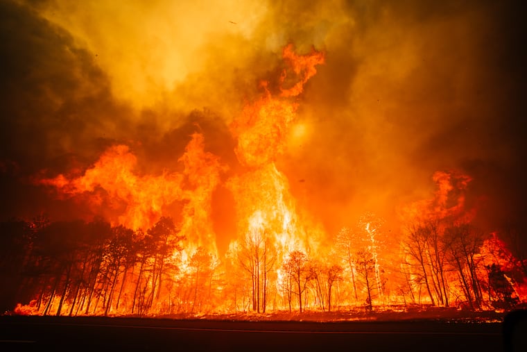 The flames of the Jones Road wildfire in Ocean County, New Jersey, where 19-year-old Joseph Kling was charged for arson in connection with sparking the blaze that has grown to cover 15,000-acres since Tuesday, April 21, 2024.