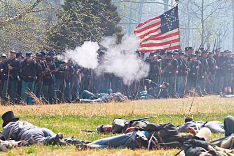 SREENACT21 -- Civil War Reenactment at the Neshaminy State Park at Bensalem,PA
Union solders are firing to confederate solders during the reenactment.
April 20, 2013. ( AKIRA SUWA / Staff Photographer )