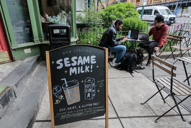 Green Line Cafe, 4239 Baltimore Ave., displays a sign advertising the sesame milk it has begun selling to cater to the growing demand for alternative, environmentally friendly milk.