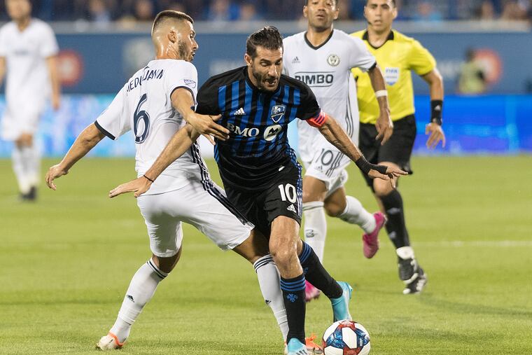 Montreal Impact star Ignacio Piatti gets past the Union's Haris Medunjanin during the first half.