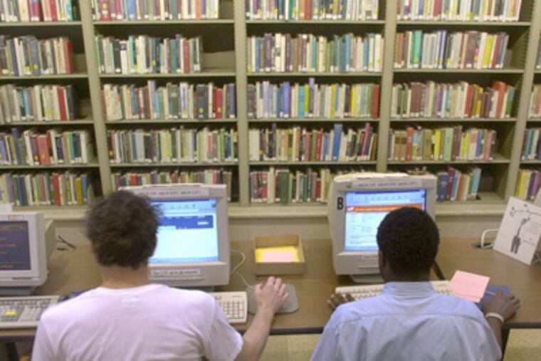 E-books have become so popular that the Free Library of Philadelphia reports a surge from July 2011, when there were 17,000 downloads, to last month, when there were 26,800 downloads. DAN LOH / Associated Press