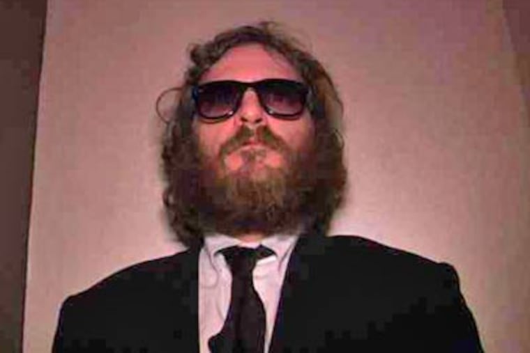 Joaquin Phoenix in the documentary-like movie that follows the actor for a year as he announces his retirement to become a hip-hop artist. (Magnolia Pictures)