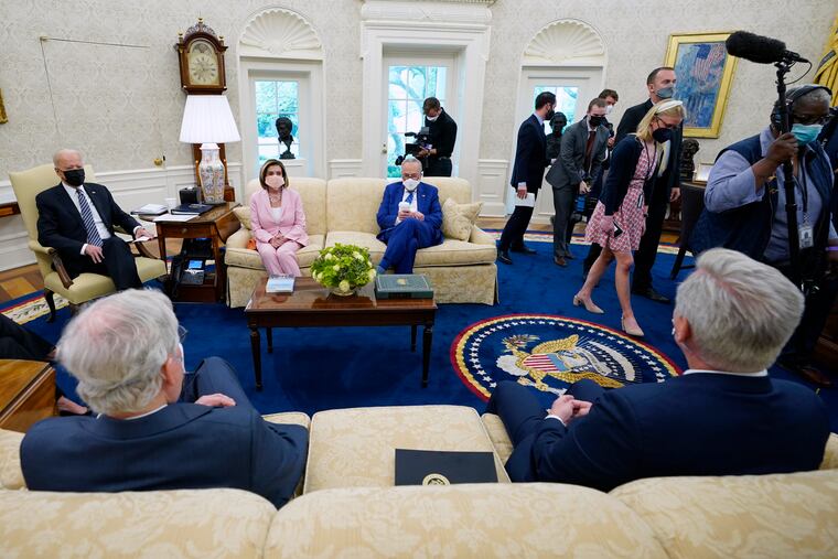Members of the media are escorted out as President Joe Biden meets with congressional leaders in the Oval Office of the White House, Wednesday, May 12, 2021, in Washington. Clockwise from left, Biden, House Speaker Nancy Pelosi of Calif., Senate Majority Leader Chuck Schumer of N.Y., Senate Minority Leader Mitch McConnell of Ky., and House Minority Leader Kevin McCarthy of Calif.