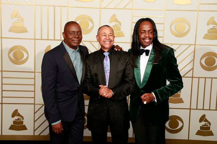 Recording artists Philip Bailey, Ralph Johnson and Verdine White of music group Earth, Wind & Fire backstage at the 58th Annual Grammy Awards on Monday, Feb. 15, 2016. Drummer Fred White (not pictured) has died at 67.