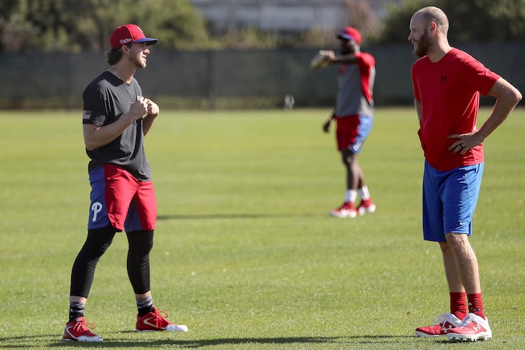 The Phillies have the advantage of two aces in Aaron Nola, left, and Zack Wheeler.