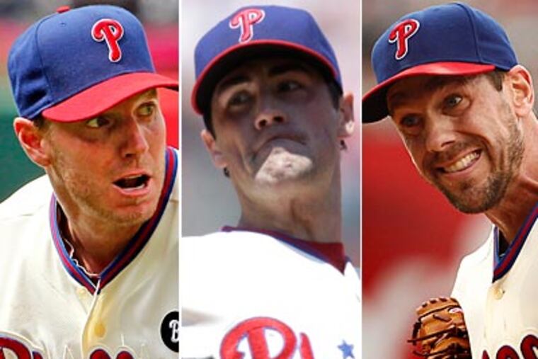 Roy Halladay, Cole Hamels and Cliff Lee combined for 31 wins in the first half of the season. (Staff Photos)