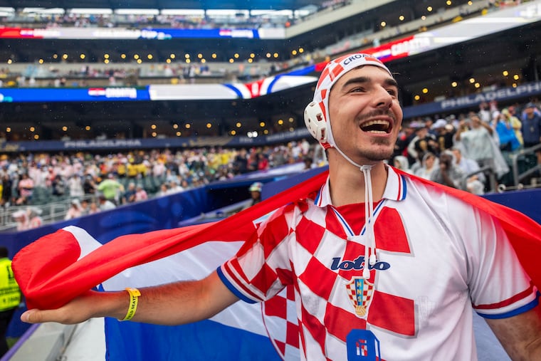 Carter Pike, 23, of Greenville, S.C., cheers for Croatia before Saturday's World Cup game against Ghana.