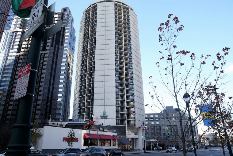 The Embassy Suites at 18th and the Parkway is one of three cylindrical structures built on triangular lots along the diagonal boulevard.