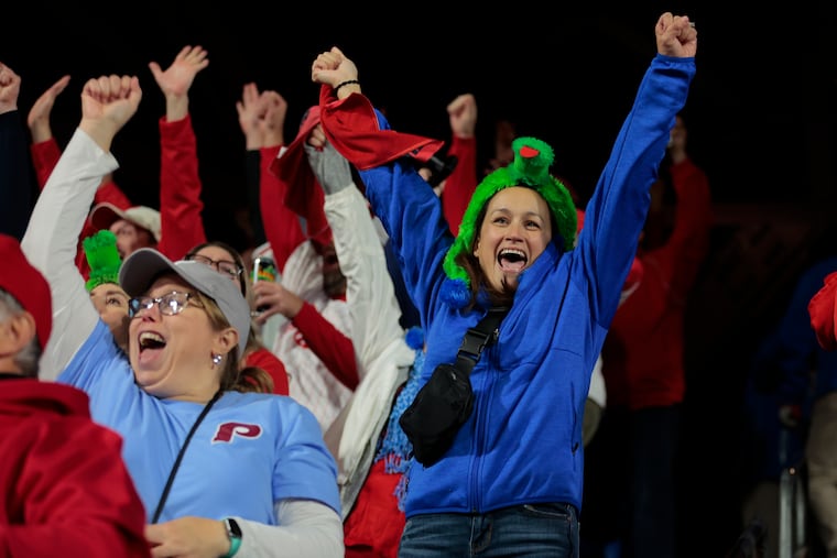 Gail Martin (right) reacts to Alec Bohm's solo home run for the Phillies in the 2nd inning during Game 7 of the National League Championship Series against the Arizona Diamondbacks on Oct. 24, 2023 at Citizens Bank Park.