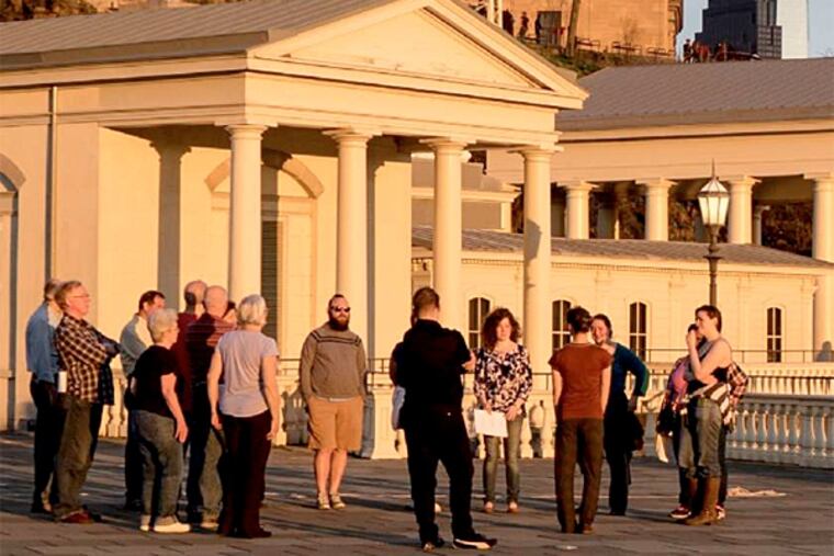 Mendelssohn Club singers rehearse Byron Au Yong's "Turbine," to be performed with Leah Stein Dance Company at Fairmount Water Works. (Sharon Torello)