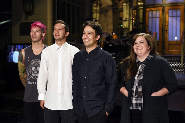 Lin-Manuel Miranda (second from right) is nominated for hosting “Saturday Night Live.” Pictured with Josh Dun and Tyler Joseph of musical guest Twenty One Pilots and “SNL” cast member Aidy Bryant