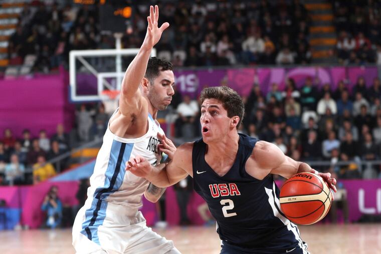 Collin Gillespie drives past Argentina's Luca Vildoza in the semifinal of the the Pan American Games on Saturday. Gillespie, along with Villanova teammate Jermaine Samuels, traveled to Lima, Peru to represent Team USA in the tournament.