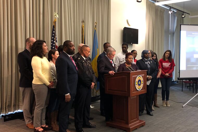 District Attorney Larry Krasner is accompanied by city officials including Police Commissioner Richard Ross, City Council President Darrell Clarke, and City Council member Kenyatta Johnson at news conference Wednesday, Jan. 23, 2019.
