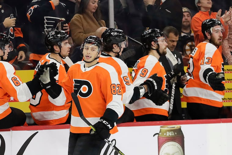 Flyers center Connor Bunnaman celebrates his second-period goal with his teammates Monday.