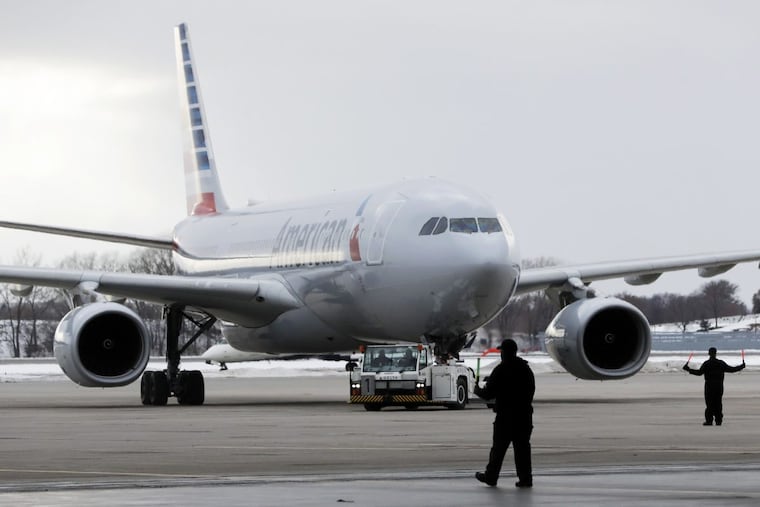 The aircraft carrying the Philadelphia Eagles arrives Sunday in Minneapolist for Super Bowl LII. American and other carriers are adding flights to Minnesota to accommodate the crush of Eagles fans.